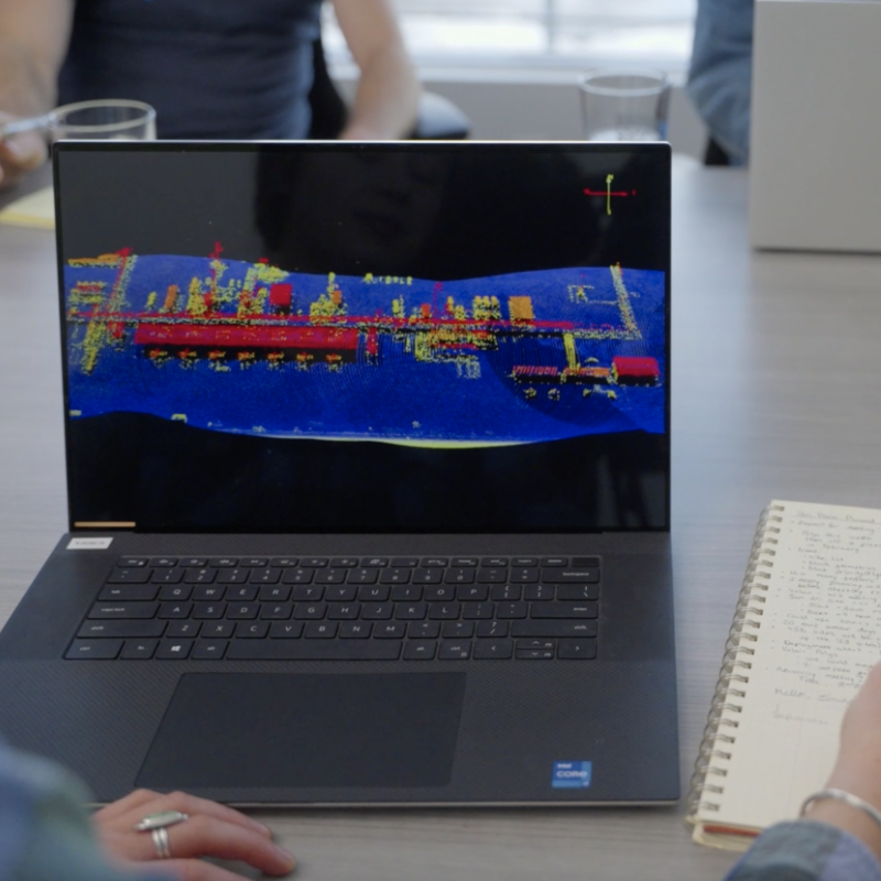 Closeup of laptop showing Lidar visual of pipes
